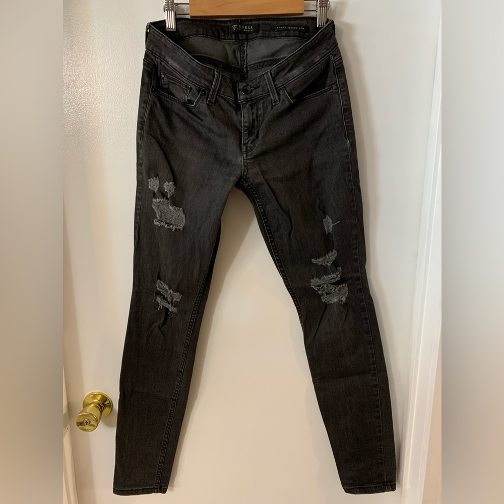Guess power skinny low rise jeans.